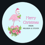 Pink Flamingo in Santa Hat Whimsical Christmas Classic Round Sticker<br><div class="desc">Stickers with a tropical themed Christmas flamingo wearing a pink santa hat. Underneath its feet is a candy cane bouquet with pretty tropical flowers and pink berries. A sprig of holly on its chest.</div>