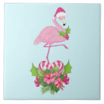 Pink Flamingo in Santa Hat with Candy Cane Bouquet Ceramic Tile<br><div class="desc">Ceramic tile with a tropical themed Christmas flamingo wearing a pink santa hat. Underneath its feet is a candy cane bouquet with pretty tropical flowers and pink berries. A sprig of holly on its chest.</div>