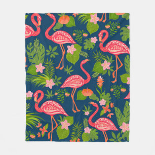 Pink flamingo ornament on a striped turquoise back fleece blanket