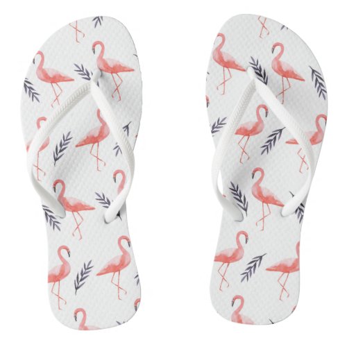 Pink flamingos and palm tree leaf tropical pattern flip flops