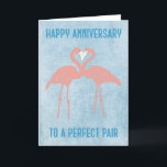 Pink Flamingos Happy Anniversary Card to Couple<br><div class="desc">Wish parents, friends or another perfect couple a happy wedding anniversary with this flamingo greeting cards. This card features an illustration of a pair of flamingos in a coral pink color set against a light blue background. Message on front: HAPPY ANNIVERSARY TO A PERFECT PAIR Inside Message: SENDING YOU BOTH...</div>