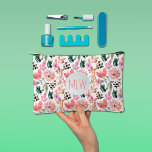 Pink Floral Monogrammed Accessory Pouch<br><div class="desc">Stylish pink floral pattern features your monogram initials on the front of this small accessory pouch. Perfect for cosmetics, pencil case, store your charging cords or anything. Measures 8.5" x 6" (transfer to the larger size), this pouch is made with an all-over print on durable woven material with a zippered...</div>