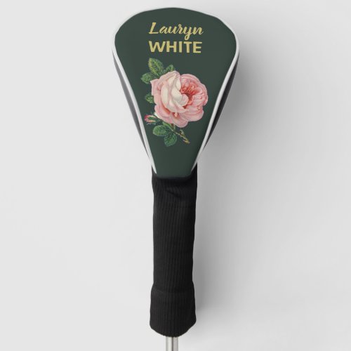 Pink flower and leaves on dark green golf head cover