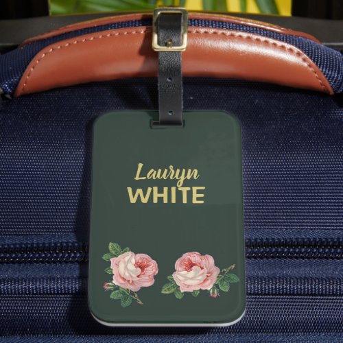 Pink flower and leaves on dark green luggage tag