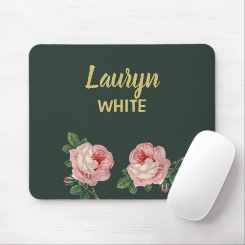 Pink flower and leaves on dark green mouse pad