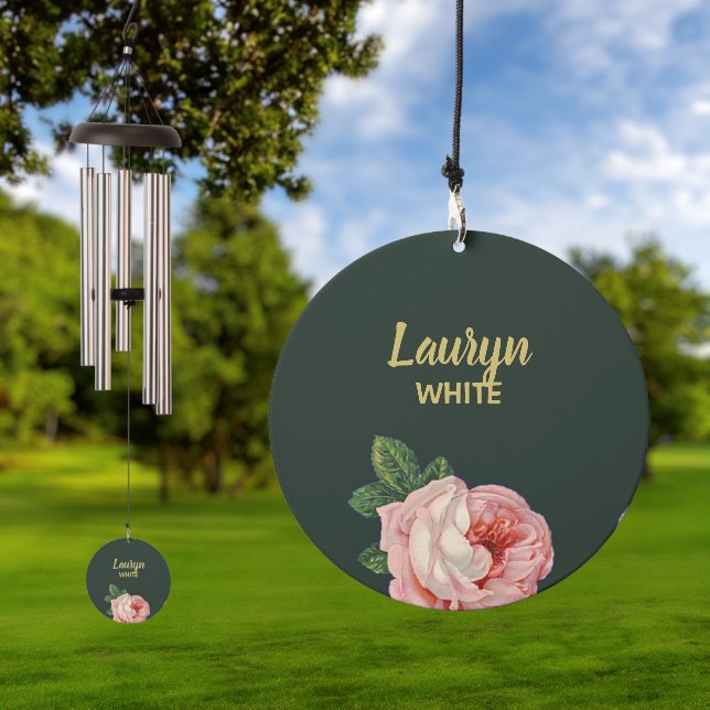 Pink flower and leaves on dark green wind chime  (Outdoor)