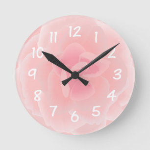 Pink flower done in watercolour effects round clock