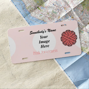 Pink Flower Ribbon by Kenneth Yoncich License Plate