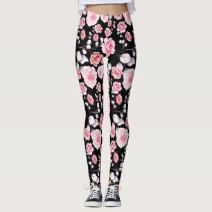 Pink flowers pattern over black leggings