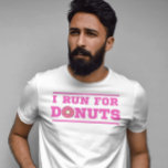 Pink funny quote about running I run for donuts  T-Shirt<br><div class="desc">What do you run for? We all have different motivational sourcecs, and some of us have weird crazy, and funny ones. This one is one the funniesnt and craziest, because some of us are huge Food lovers, mostly sweet donuts fans. So personally, i Run for Donuts, this sweeet lovely tasty...</div>