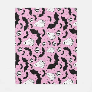 Pink ghosts, bats and pumpkins fleece blanket