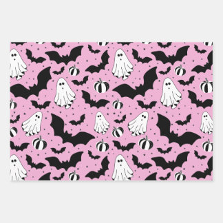 Pink ghosts, bats and pumpkins wrapping paper sheets