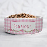 Pink Gingham Floral Personalized Pet Bowl<br><div class="desc">Elevate your pet’s dining experience with this charming, personalized pet bowl. Adorned with a classic pink gingham checks pattern and a pretty floral vine, this bowl exudes sweetness and femininity. Add a personal touch by customizing it with a pet’s name. Whether you’re searching for something unique for your own furry...</div>