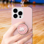 Pink girly basketball w name jersey number PopSocket<br><div class="desc">This cute girly basketball PopSocket features a pink,  digitally textured basketball graphic with overlying gray and white text - easily personalize with the player's name in a signature style font atop the player's jersey number in a varsity letter style font - by katz_d_zynes</div>