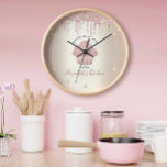 Pink Glitter Drips Cupcake Bakery Pastry Chef Gold Clock<br><div class="desc">Make a stylish impression with this elegant, sophisticated, simple, and modern custom name wall clock. A sparkly, rose gold cupcake, script handwritten typography and glitter drips overlay a faux metallic champagne gold ombre background. Personalize with your full name, business, or other info. Your choice of a round or square clock...</div>