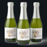 Pink & Gold 40th Birthday Sparkling Wine Label<br><div class="desc">This 40th Birthday sparkling wine label features a pink and gold watercolor splash and a modern chic font combination. With its girly vibes, it is perfect for a modern chic woman. Do you need it for a different age? No problem, it can be personalized by clicking the "PERSONALIZE" button and...</div>