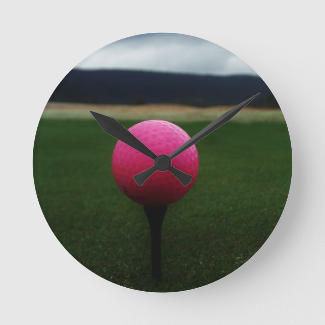 Pink Golf Ball on a mountain golf course Round Clock (Front)
