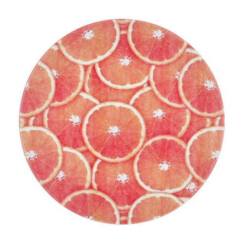 Pink grapefruit slices cutting board