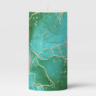 Pink, green, and teal alcohol ink pillar candle