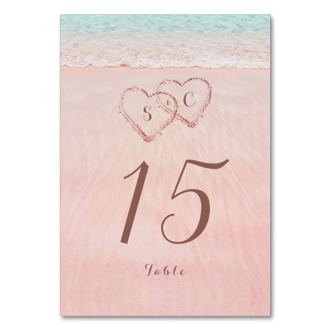 Pink hearts in the sand destination beach wedding table number (Front)