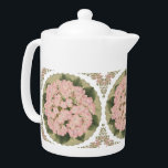Pink Hydra floral pattern Medium Teapot<br><div class="desc">intricate floral pattern multicolor orange, green yellow on white background. Intricate floral pattern. This can also be gifted to your friends, mom, sister and other relatives who have small kids. Natural color pattern with light colors. This design transforms your space into a haven of tranquility, blending elegant aesthetics with calming...</div>