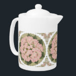 Pink Hydra floral pattern Medium Teapot<br><div class="desc">intricate floral pattern multicolor orange, green yellow on white background. Intricate floral pattern. This can also be gifted to your friends, mom, sister and other relatives who have small kids. Natural color pattern with light colors. This design transforms your space into a haven of tranquility, blending elegant aesthetics with calming...</div>