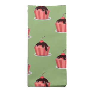 Pink ice cream cups on green cloth napkin