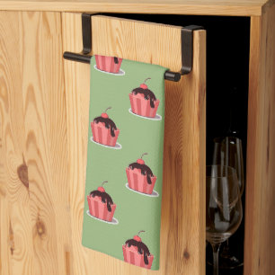 Pink ice cream cups on green kitchen towel