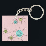 Pink Iconic Atomic Starbursts Acrylic Keychain<br><div class="desc">This Pink Iconic Atomic Starbursts Acrylic Keychain pattern features iconic atomic starbursts. That’s right! The old school, First Lady Pink colored background with gold speckles is the perfect backdrop for the vibrant turquoise, soothing celery, and kitschy pear green colored circles. The spots of color are sporadically placed in various sizes...</div>