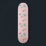 Pink Iconic Atomic Starbursts Skateboard Deck<br><div class="desc">This Pink Iconic Atomic Starbursts Skateboard pattern features iconic atomic starbursts. That’s right! The old school, First Lady Pink colored background with gold speckles is the perfect backdrop for the vibrant turquoise, soothing celery, and kitschy pear green colored circles. The spots of color are sporadically placed in various sizes with...</div>