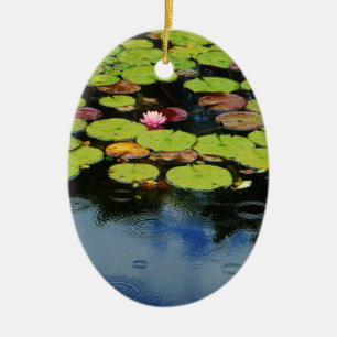 Pink lotus in Rain Ceramic Ornament