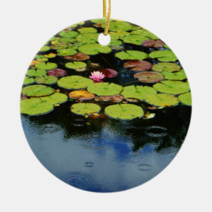 Pink lotus in Rain Ceramic Ornament