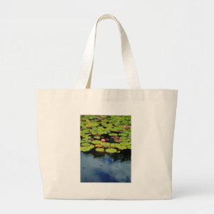 Pink lotus in Rain Large Tote Bag