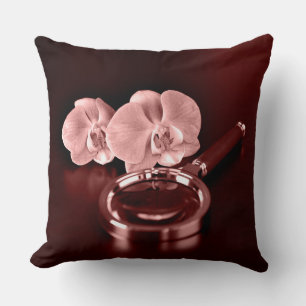 Pink orchid flowers and magnifying glass throw pillow