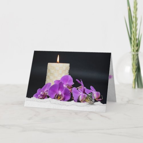 pink orchids and candle with butterfly sympathy card
