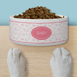 Pink Pattern Of Cute Dog Things With Custom Name Bowl<br><div class="desc">Destei's cute pattern of different kind of dog stuff including dogs in pink and white color scheme. The pattern includes a standing dog profile and an illustration of a cute dog's head with floppy ears. There are also dog supplies and toys mixed in the pattern such as a bunny dog...</div>