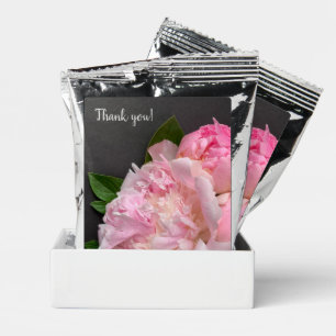 Pink peonies on dark gray coffee drink mix
