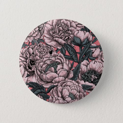 Pink peony flowers and moths button