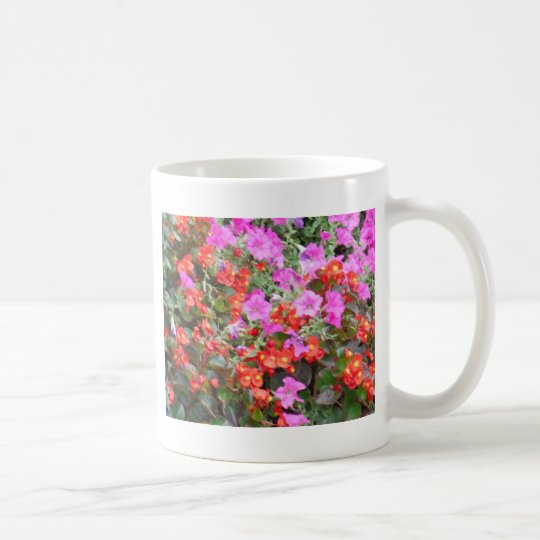 Pink petunia and red geraniums coffee mug