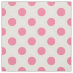 Pink polka dots on cream fabric