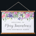 Pink Purple Floral 90th Birthday Welcome Banner Hanging Tapestry<br><div class="desc">Lush floral border along the top of of this 90th birthday welcome banner features soft pink, purple and blue flowers nestled in a variety of green foliage. Dangles give it a modern Boho chic vibe. The birthday celebrant's name is written in a script font. All of the text can be...</div>