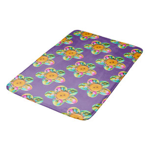 Pink, purple, yellow flowers on purple bath mat