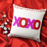 Pink Red XOXO Hearts Valentine’s Day Bold Modern Throw Pillow<br><div class="desc">“XOXO.” A playful visual of a pink and red giant foil XOXO and a tiny red heart and dot pattern helps you usher in Valentine’s Day. Spread love and joy whenever you relax with this colorful, stylish and modern throw pillow. Matching and coordinating cards, envelopes, stickers, giftwrap, mugs, and other...</div>
