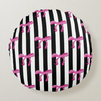 Pink ribbon bows on black and white stripes round pillow