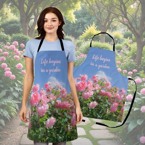 Pink rose bush under blue sky custom  apron