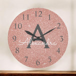 Pink Rose Gold Sparkle Glitter Monogram Name Large Clock<br><div class="desc">Pink - Rose Gold Sparkle Glitter Monogram Name and Initial Serving Wall Clock that can be used at home,  office or in a beauty salon business for Nails,  Microblading,  Eyelash Extensions (Lashes),  Hair or Makeup. The Wall Clock makes the perfect gift for someone who loves pink sparkle glitter.</div>