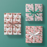pink   rose vintage black santa claus christmas wrapping paper sheets<br><div class="desc">three sheets of holiday wrapping paper adorned in unique vintage and adorable graphics of santa winking alone, saint nick and mrs claus dancing, and a chic 1950's era pin up girl, her arms full of holiday gifts, all with beautiful black skin. in seamless pattern print format. each of the three...</div>
