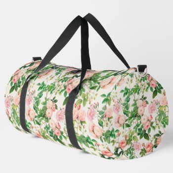 Pink Roses Garden Duffle Bag by InovArtS at Zazzle