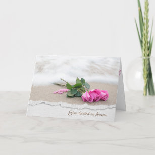pink roses on beach sand with torn edge border card