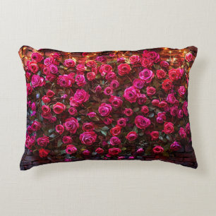 Pink Roses on Brick Wall with Decorative Lights Accent Pillow